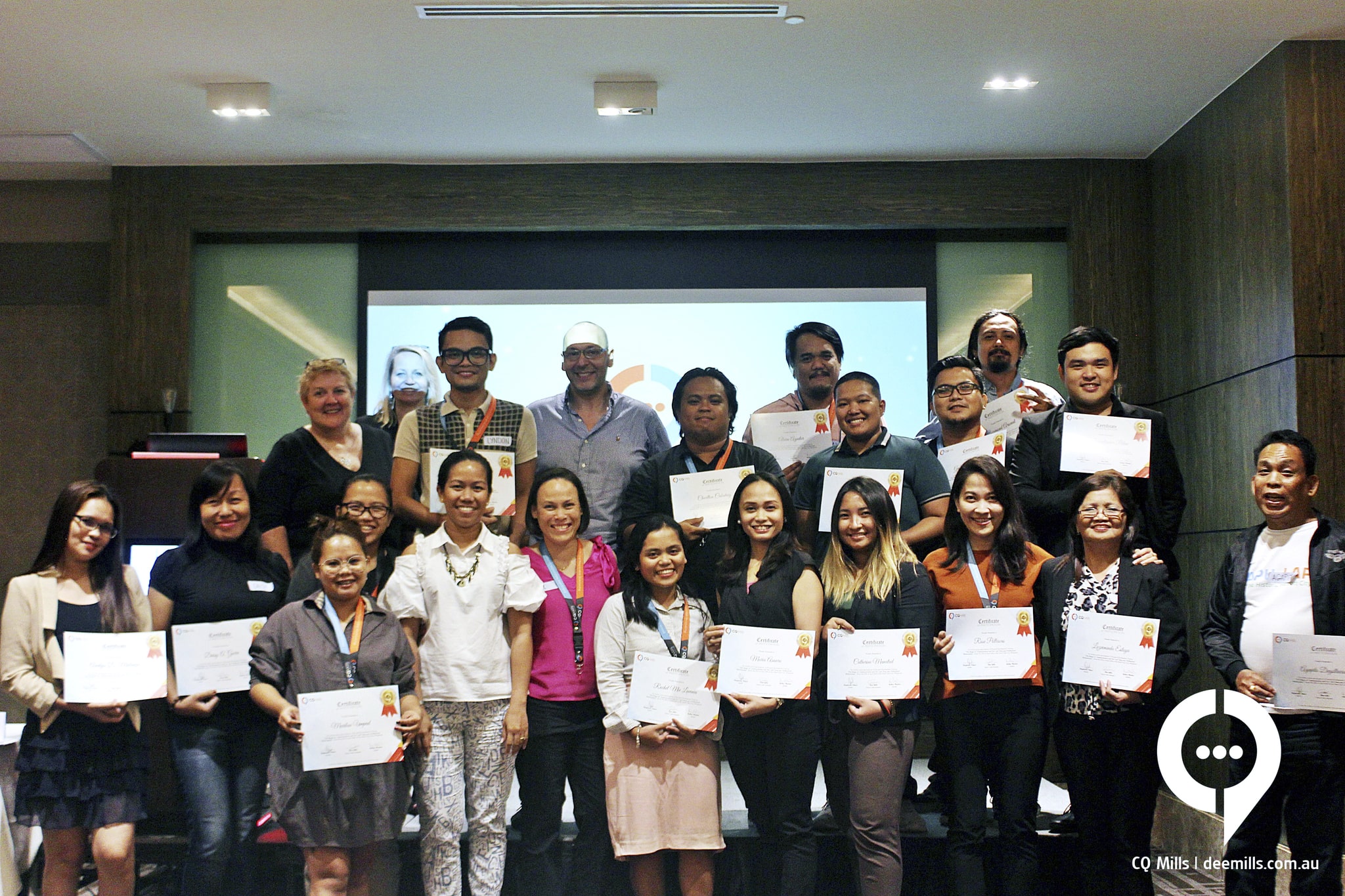 Participants, receiving their certificates after the Training